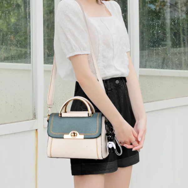 Woman with stylish handbag and shorts