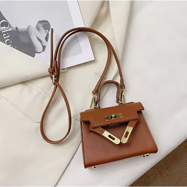 Brown leather handbag with gold hardware.