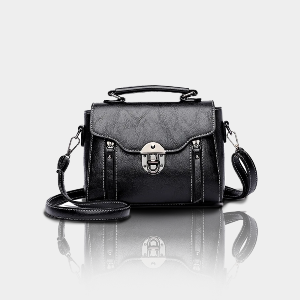 Black leather handbag with strap.