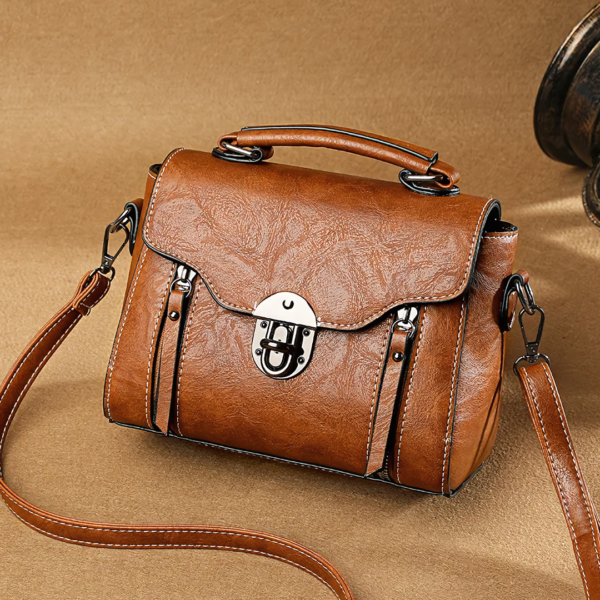 Brown leather handbag with shoulder strap