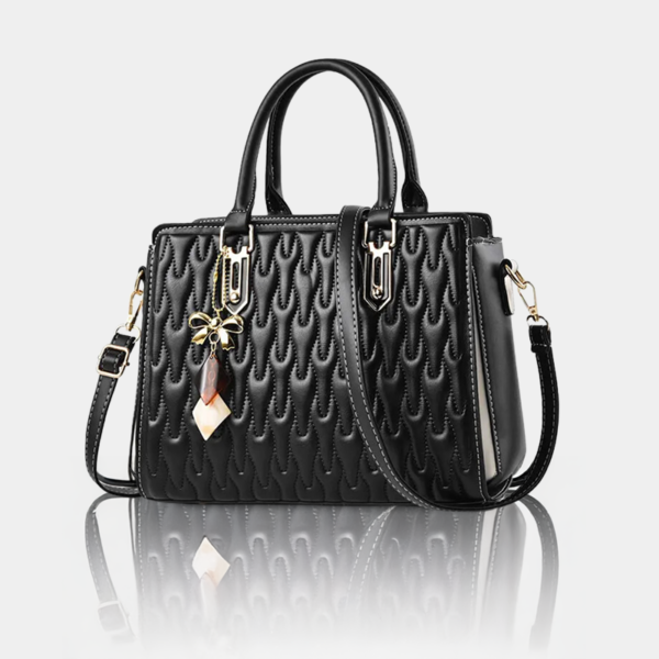 Black leather handbag with gold hardware