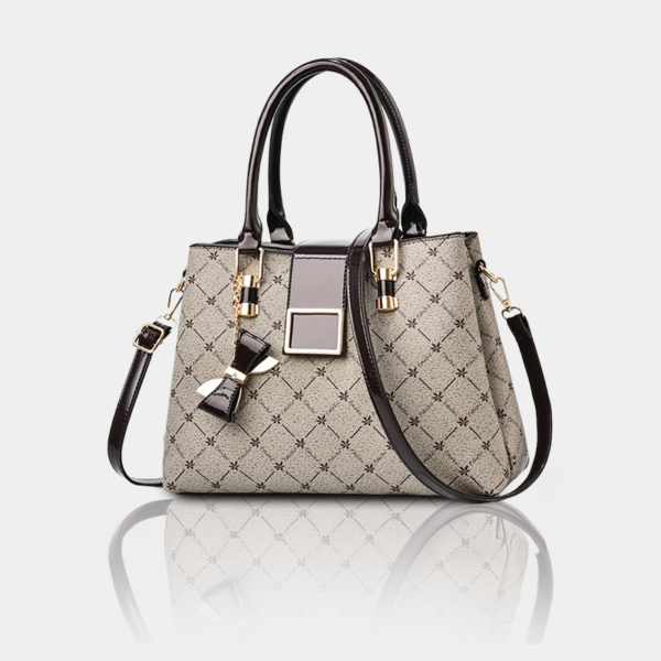 Elegant designer handbag with patterned fabric