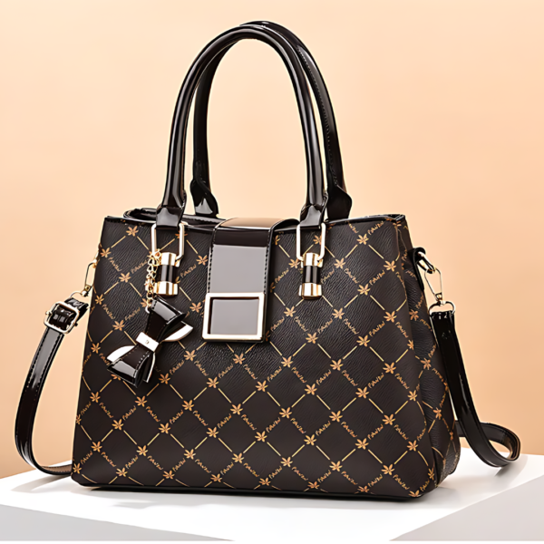 Black pattern handbag with bow charm.