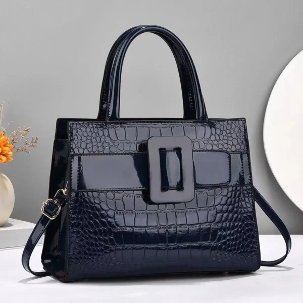 Glossy black faux crocodile handbag with buckle