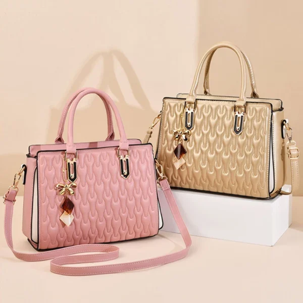 Pink and gold handbags with decorative patterns.